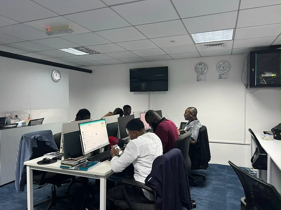 The CNK Real Estate team working at their desks in the Dubai office